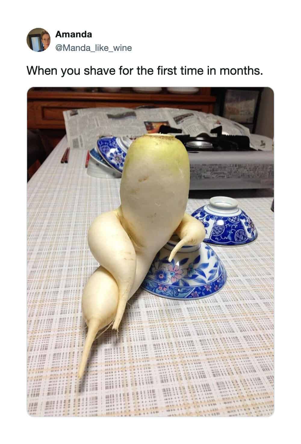 Humorous photo of a radish with a large root resembling a human face and smaller roots as limbs.