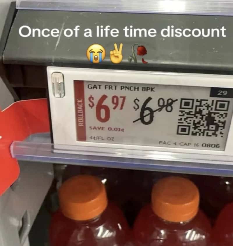 Price tag showing discount, with a crying emoji, peace sign, and rose emoji above.