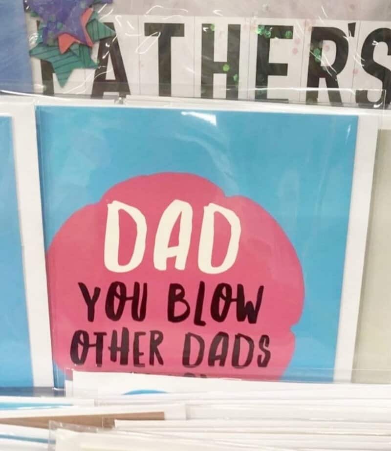 Dad you blow other dads sign with pink and blue background.