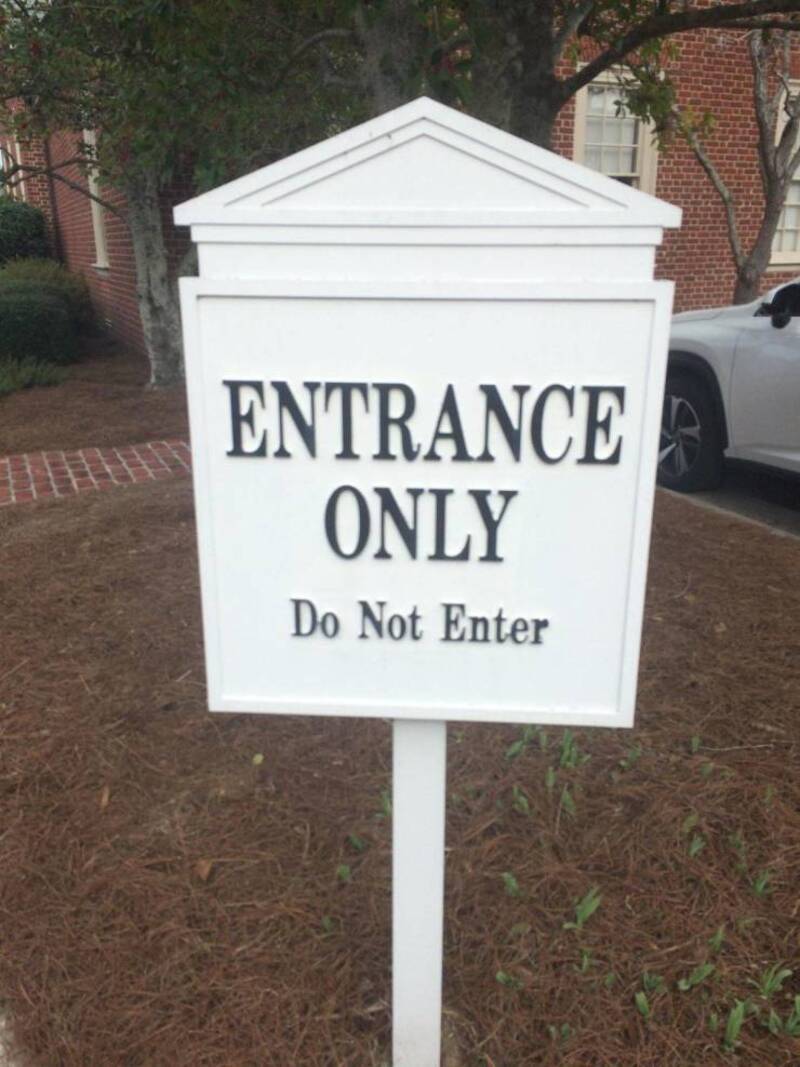 Entrance only sign with 'Do Not Enter' text below.