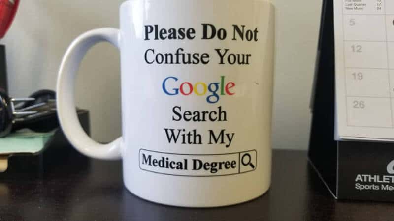 Mug with the text 'Please Do Not Confuse Your Google Search With My Medical Degree'.
