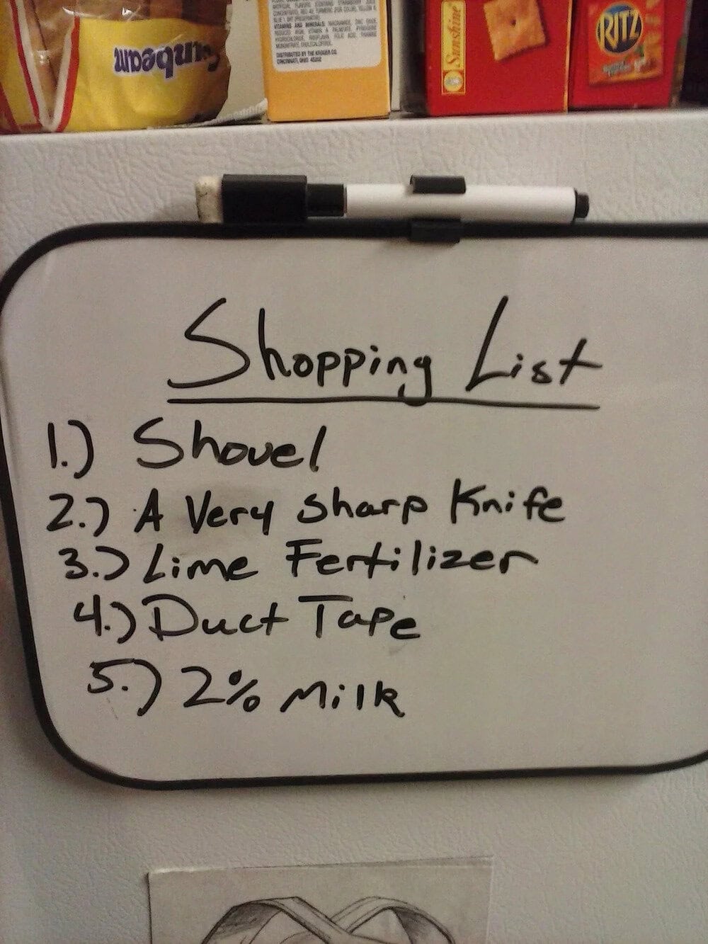 Shopping list on a whiteboard with five items written in black marker.