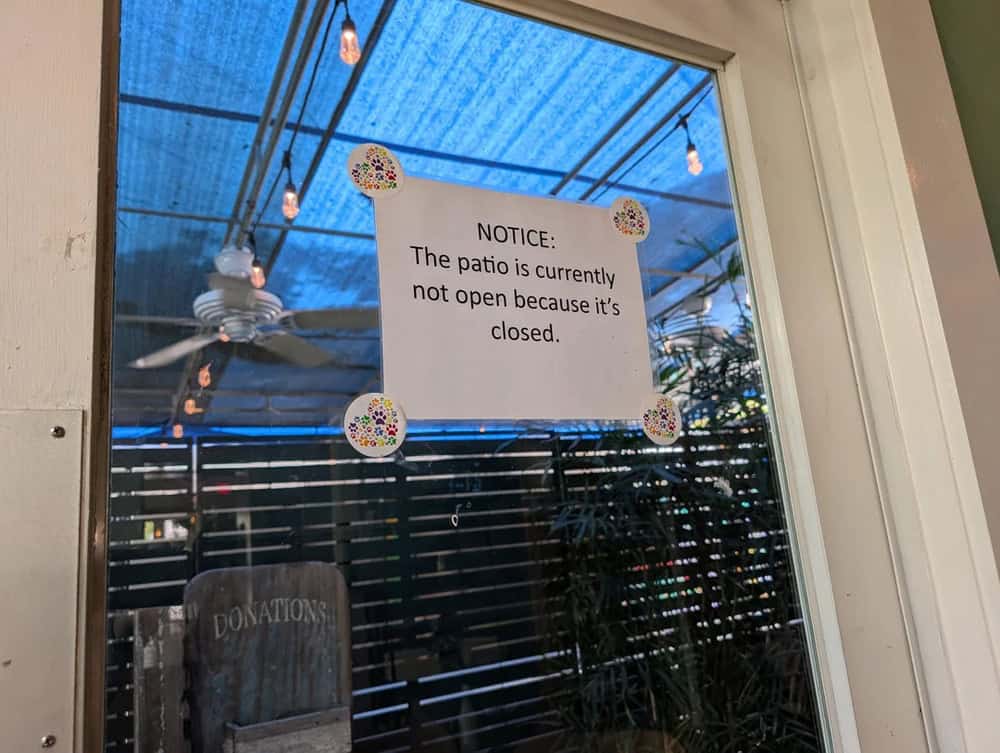 Notice on patio door: The patio is currently not open because it's closed.