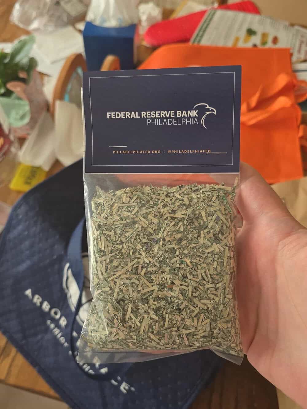 Bag of dried herbs with Federal Reserve Bank Philadelphia label.
