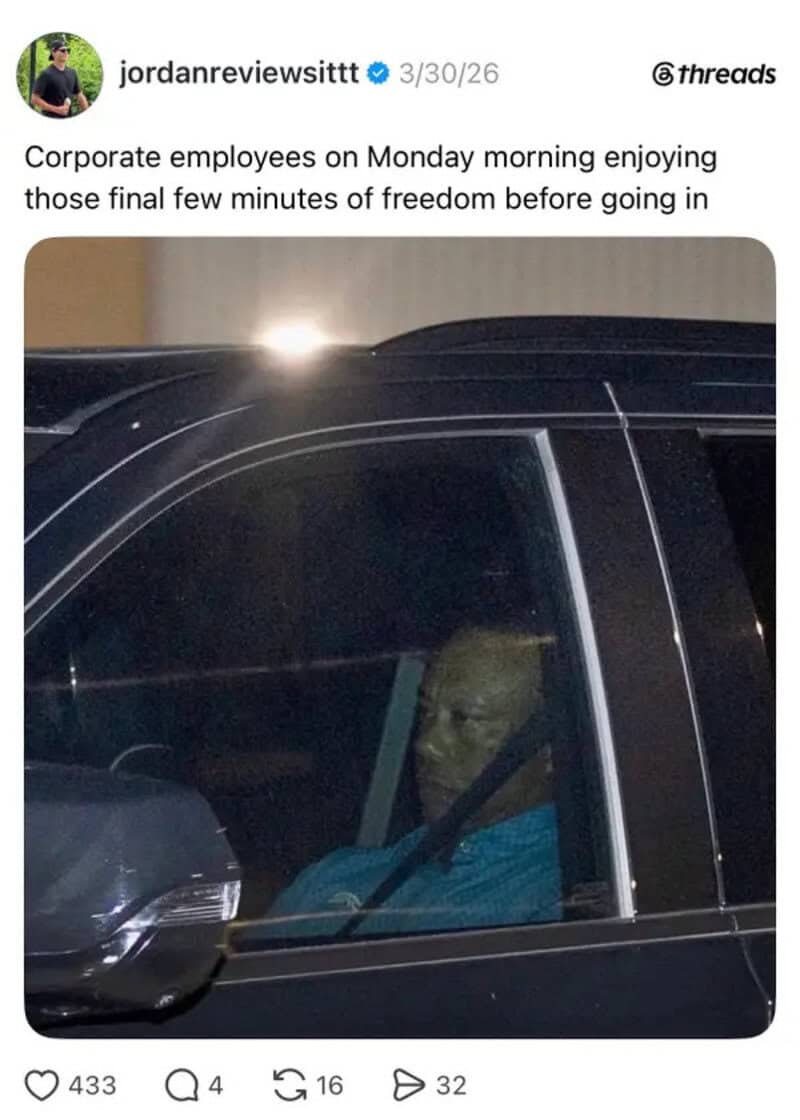 Corporate employee with a dog enjoying freedom before work on Monday morning.