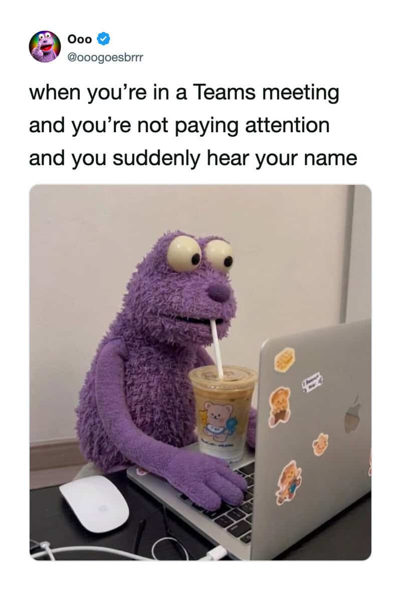 Purple puppet with big eyes drinking from a cup during a Teams meeting.