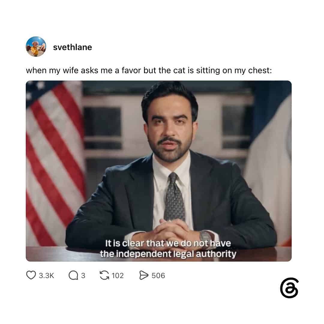 Man in suit with caption about legal authority, sitting in front of American flag.