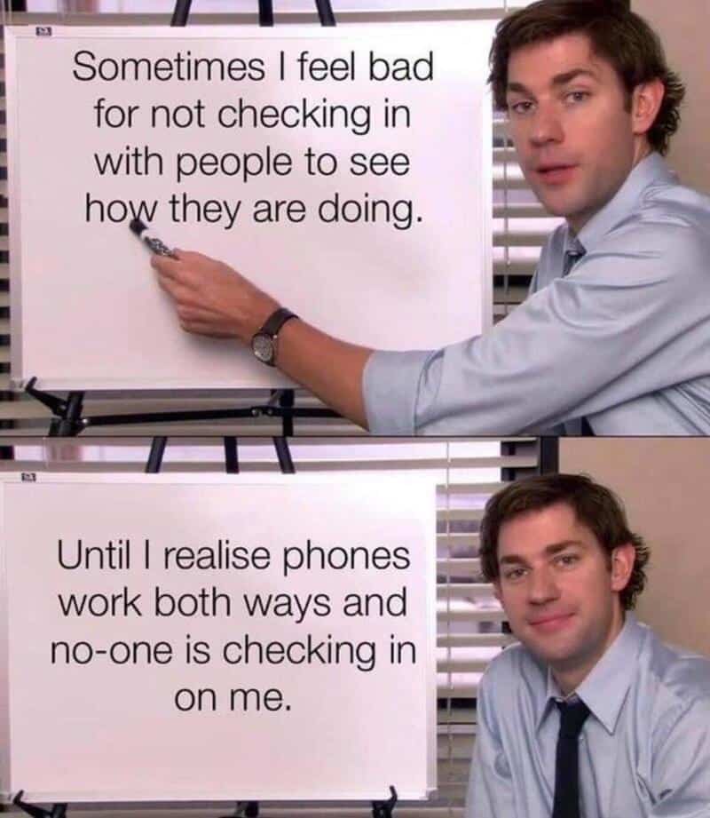 Office scene with a man pointing to a whiteboard with text about checking in on people.