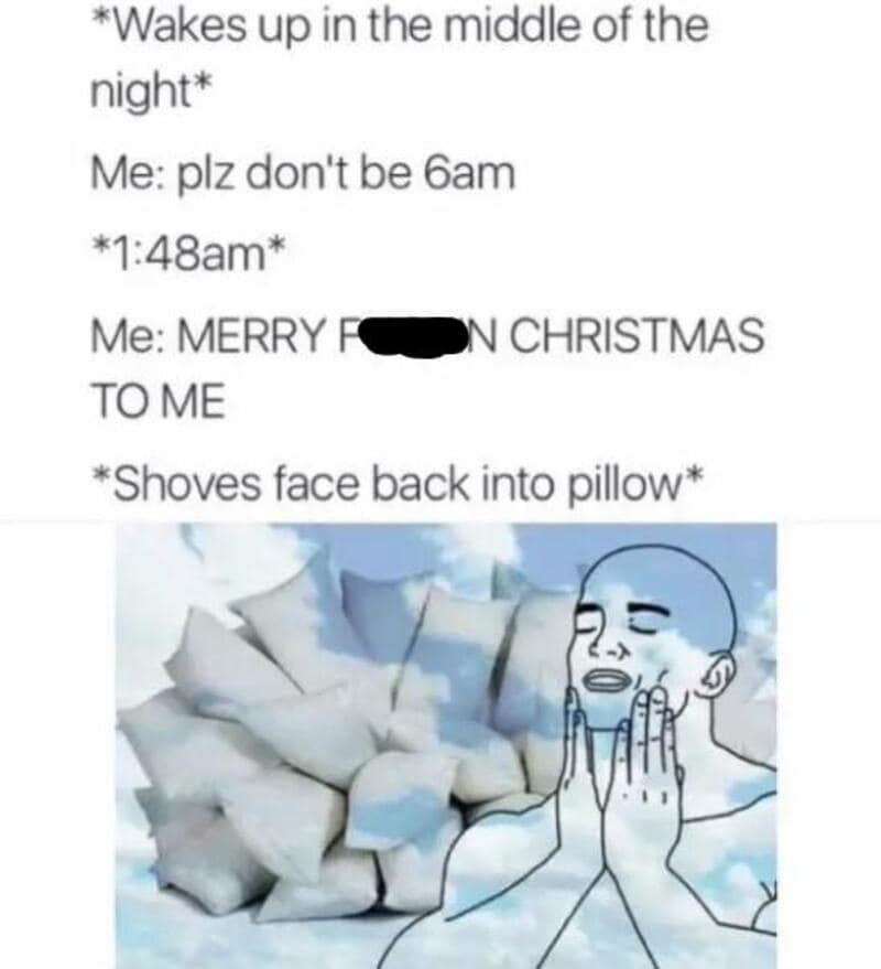 A person shoves their face into a pillow after waking up at 1:48am and wishing Merry Christmas.