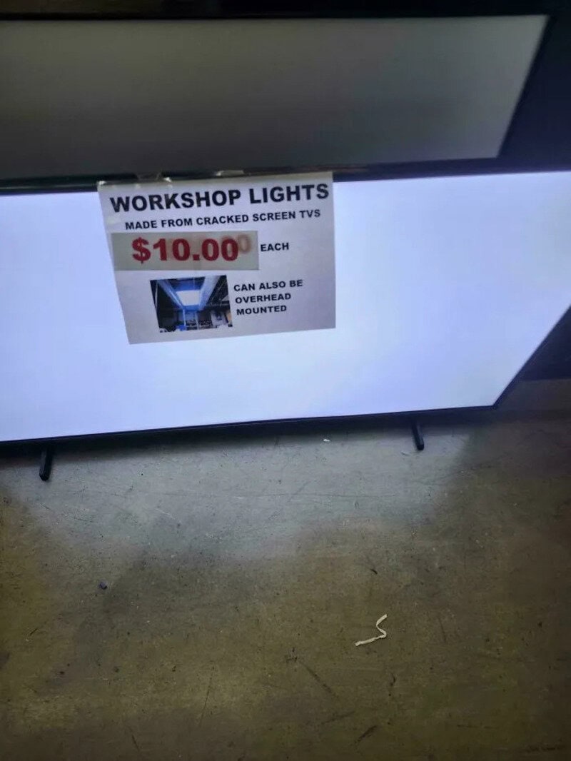 Workshop lights made from cracked screen TVs, $10 each, can be overhead mounted.