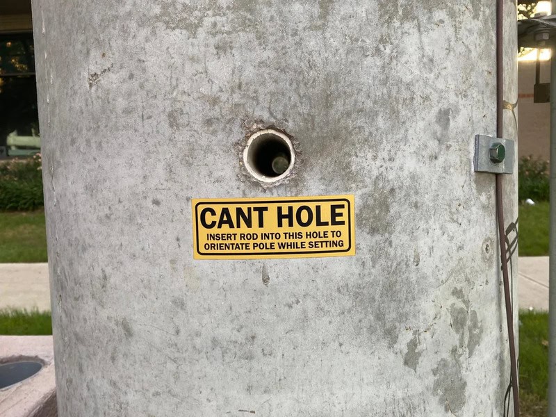 CANT HOLE insert rod into this hole to orientate pole while setting.