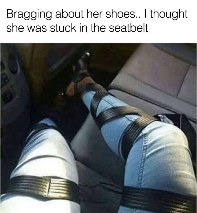 Person's legs tied with black straps in a car seat, caption about shoes and seatbelt.