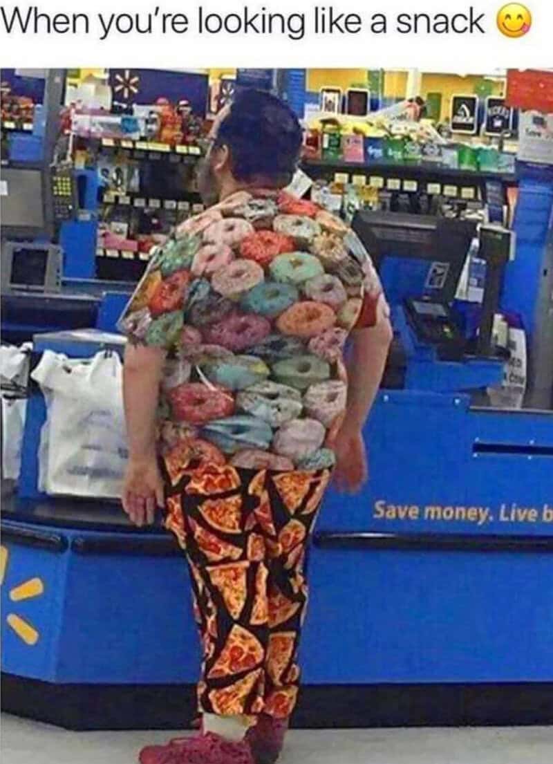 Person at checkout wearing donut-themed shirt and pizza-patterned pants.