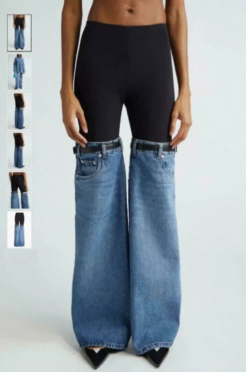 Fashion mishap with pants split to reveal jeans underneath.