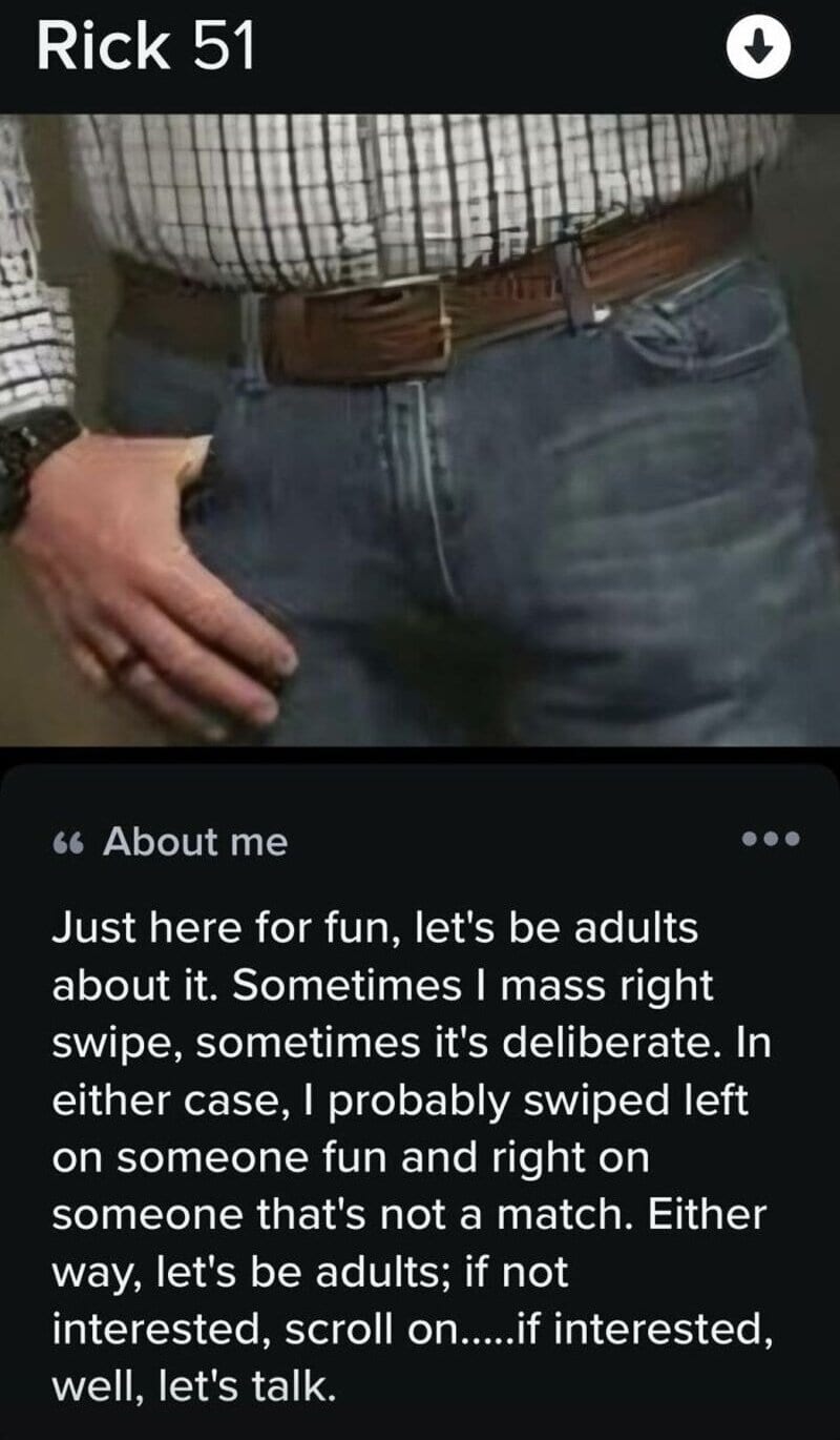 Close-up of a man wearing a checkered shirt and jeans, with a hand on his hip.