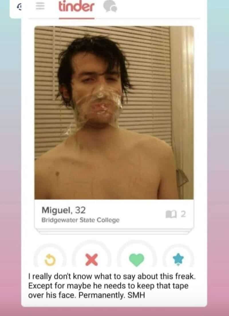 Man with tape over face on Tinder profile, no shirt, messy hair.