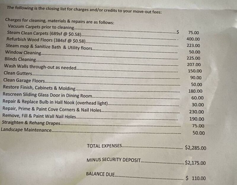 Close-up of a detailed invoice listing charges for cleaning, repairs, and maintenance.