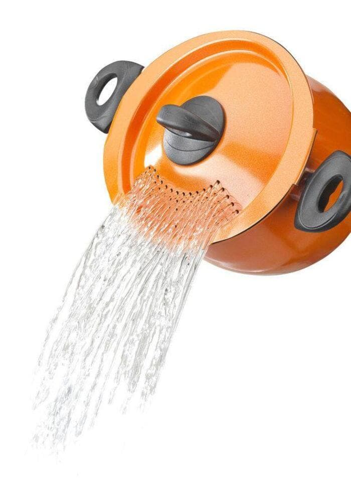 Orange water filter pitcher with water pouring out, part of innovative products.
