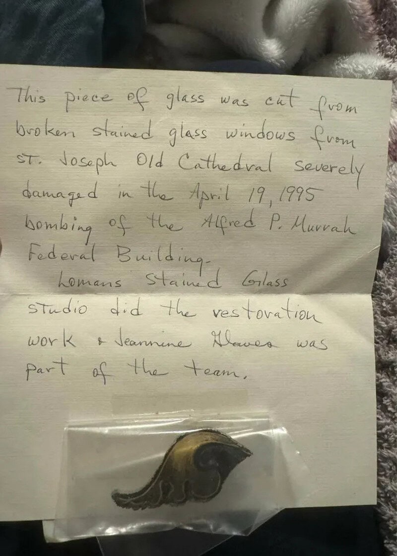 Handwritten note about a glass piece from St. Joseph Old Cathedral, damaged in 1995 bombing.