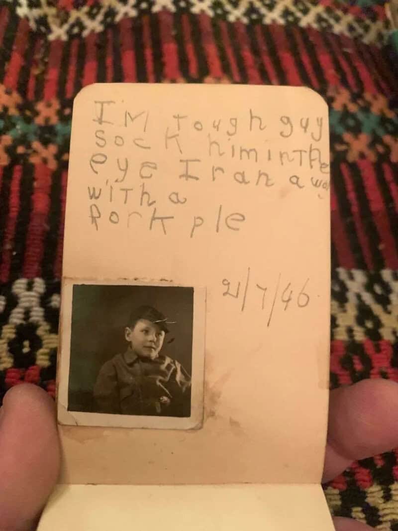 Child's handwritten note with a photo, dated 2/7/46, on a patterned fabric background.