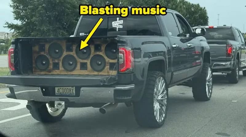 Pickup truck with large speaker system in the truck bed, labeled 'Blasting music'.
