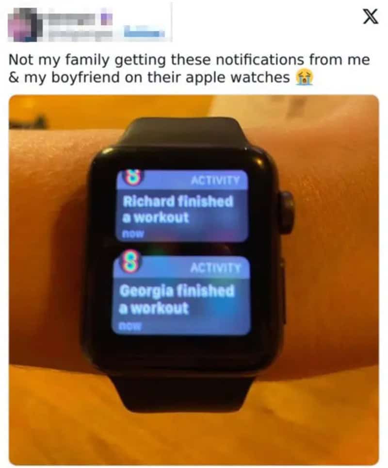 Funny notification on Apple Watch about Richard and Georgia finishing workouts.