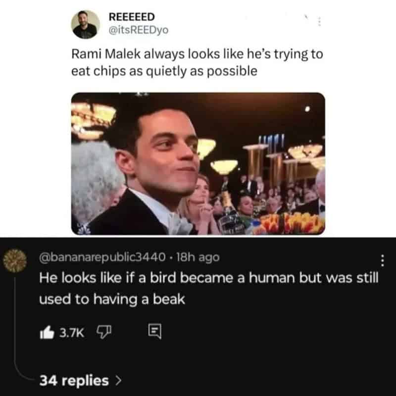 Rami Malek trying to eat chips quietly at an event.