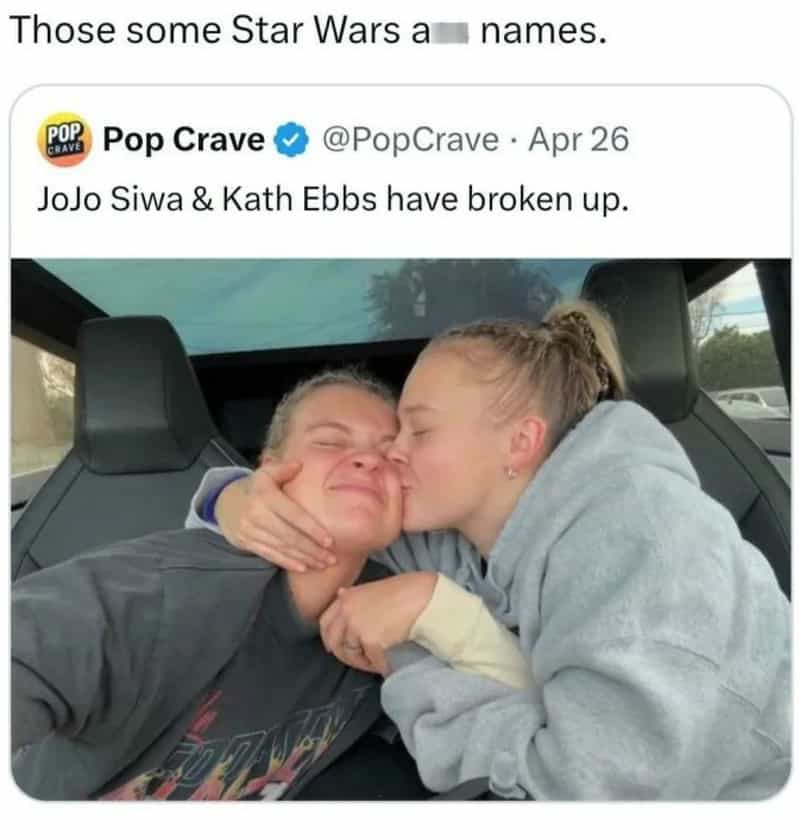 A girl kisses a boy on the cheek while he smiles with eyes closed.