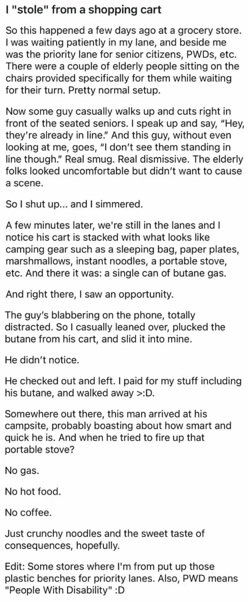 A person steals a can of butane from a shopping cart at a grocery store.