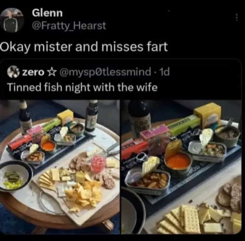 Tinned fish night with the wife, featuring various snacks and drinks on a table.