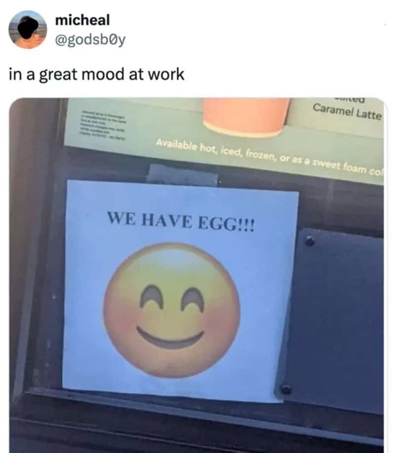 Sign says 'WE HAVE EGG!!!' with a smiling emoji face.