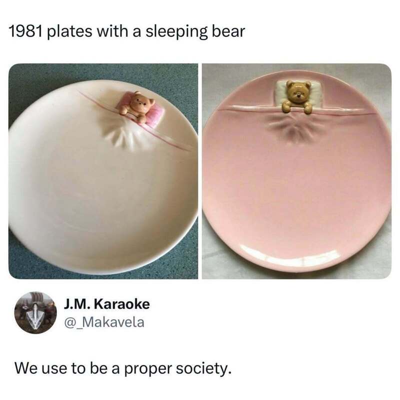 1981 plates with a sleeping bear figurine on each, one pink and one white.
