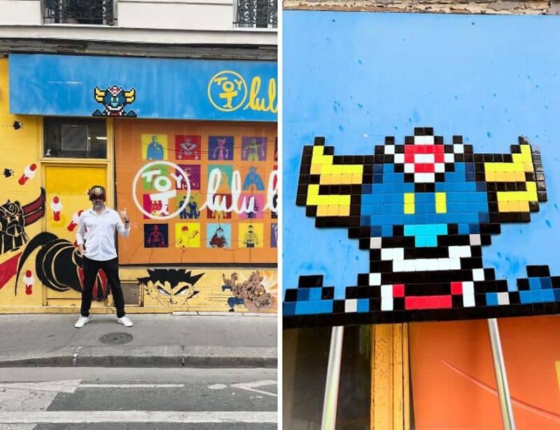 Colorful street art mosaic featuring a blue character with yellow ears and a red and white hat.