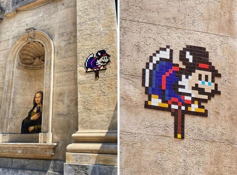 Street art mosaic of Mario from Super Mario Bros. on a stone wall.