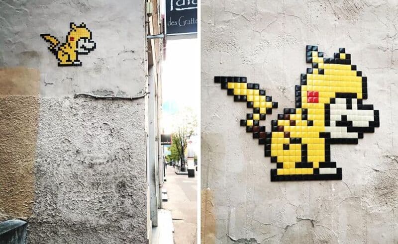 Pixel art of Pikachu on a wall, with a smaller Pikachu on the left.