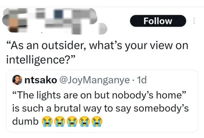 Twitter post with a quote about intelligence and a reply calling someone dumb with crying emojis.