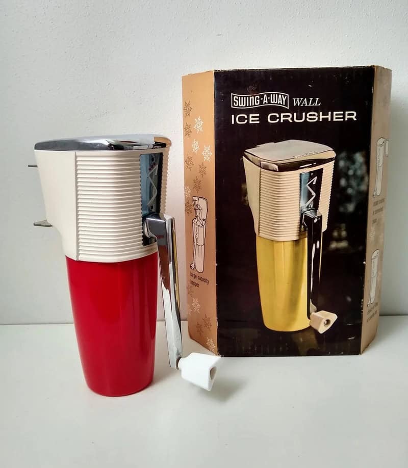 Vintage Swing-A-Way wall ice crusher with box, red and beige color.