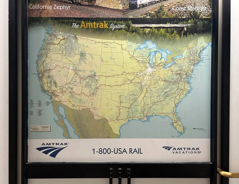 Map of the USA showing Amtrak routes and system details.