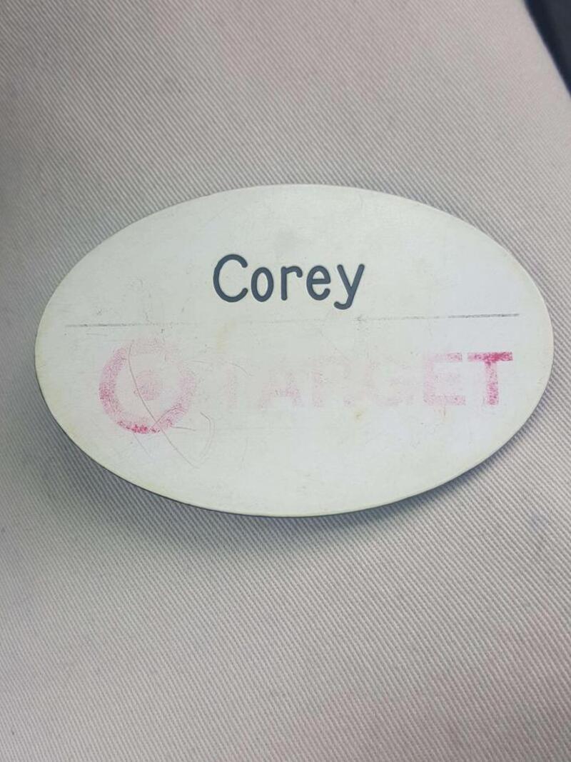 Name tag with 'Corey' and faded 'Guest' text underneath.