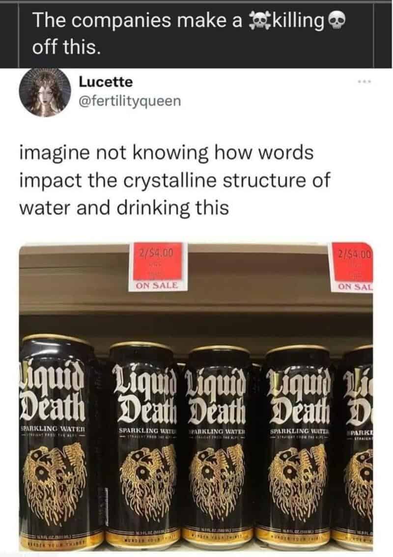 Liquid Death sparkling water cans on a store shelf with sale tags.