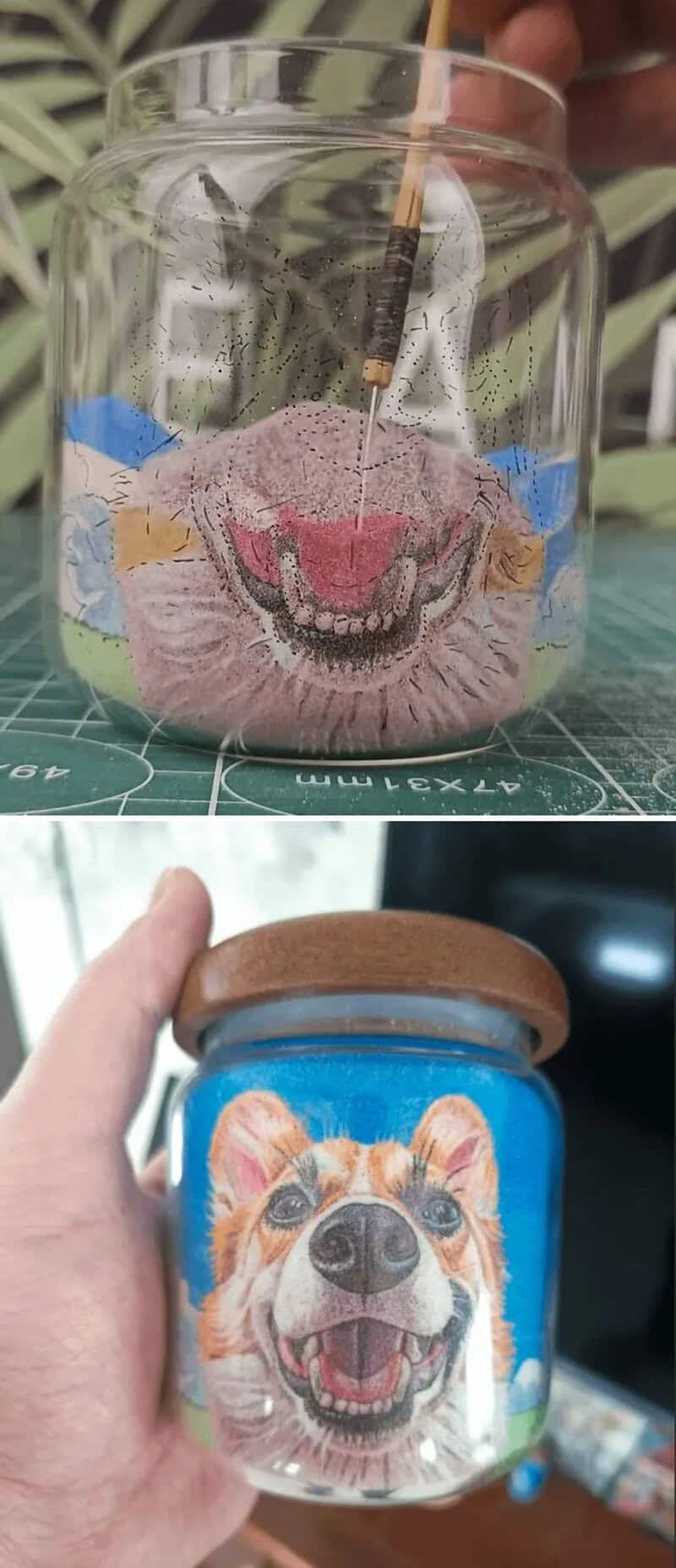 Cute dog face inside a glass jar with a pink nose and open mouth.