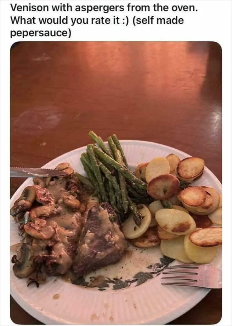 Venison with asparagus, potatoes, and green beans on a plate.