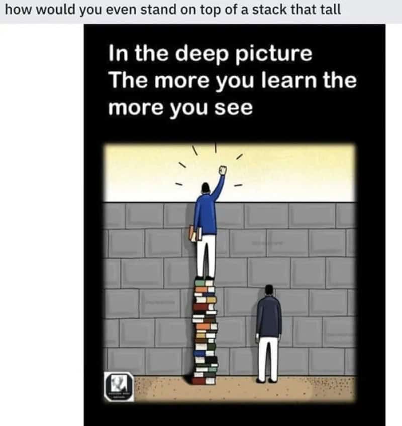 Person standing on a tall stack of books, reaching for a light bulb, with another person nearby.