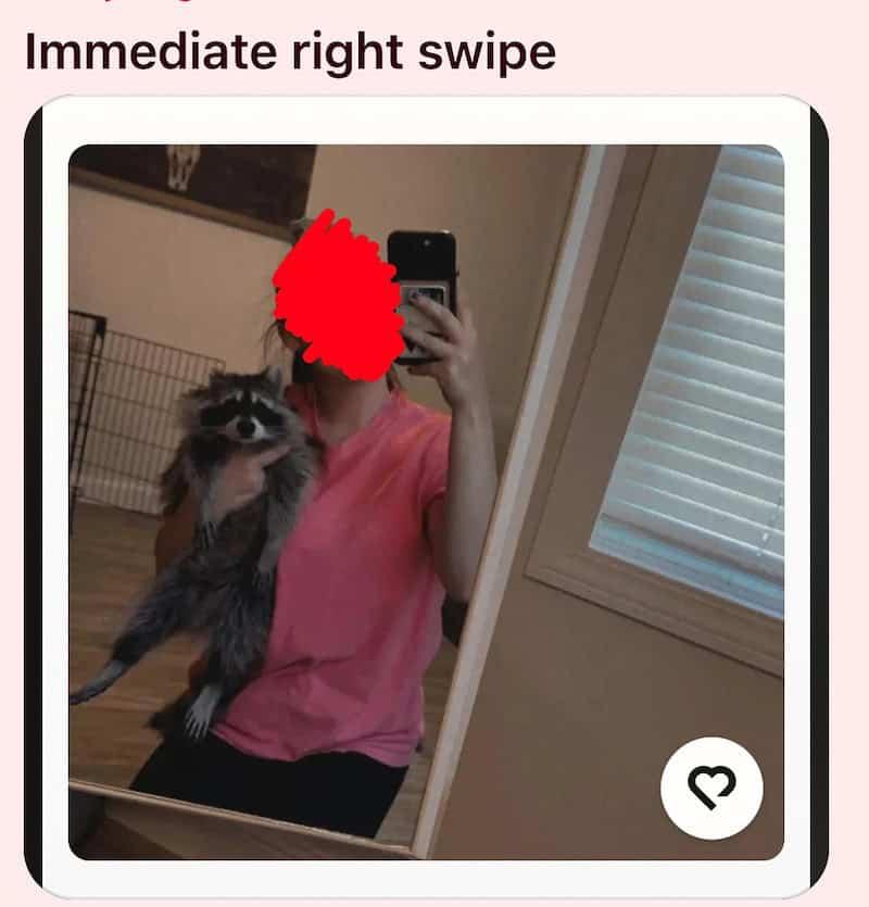 Person in pink shirt taking mirror selfie with dog, red scribble over face, text 'Immediate right sw.