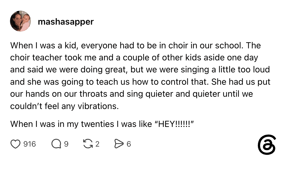 Child singing in choir with teacher, feeling proud and confident.