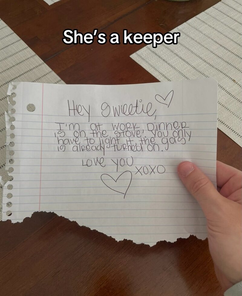 Handwritten note on torn notebook paper with a heart, saying 'Hey sweetie, I'm out for dinner, have.