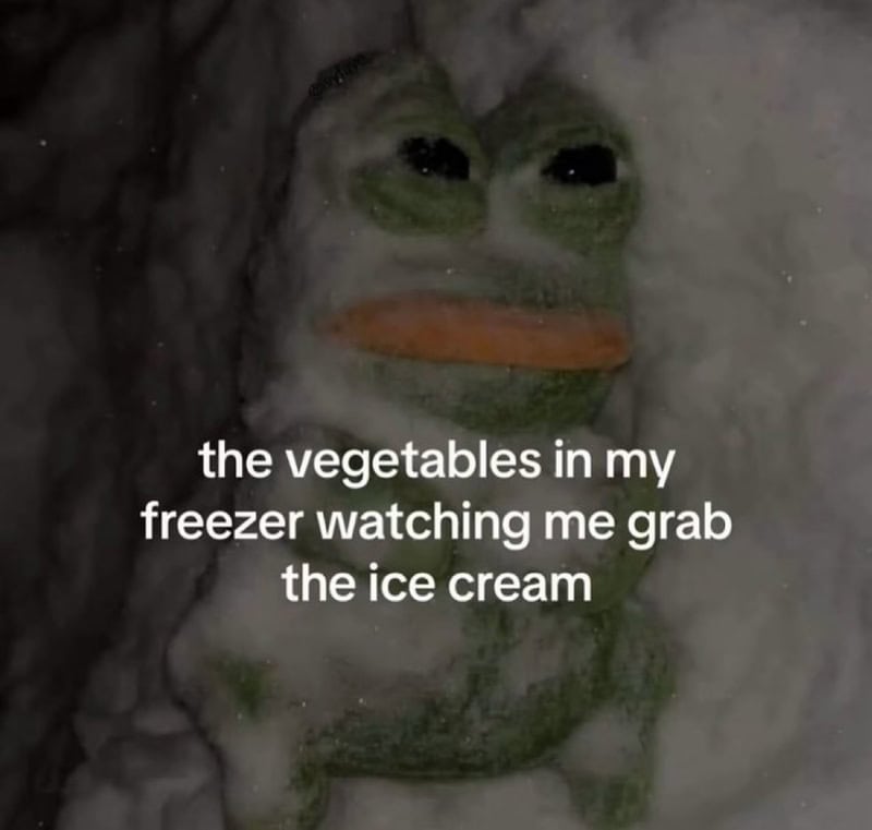 Frog-shaped ice cream in freezer with caption about vegetables watching.