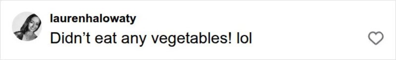 A person holding a plate with a small amount of vegetables.