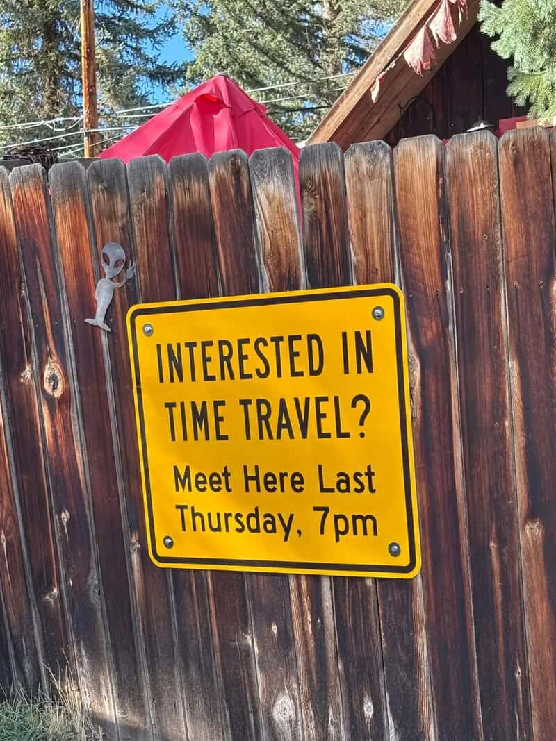 Interested in time travel? Meet here last Thursday, 7pm sign on wooden fence.