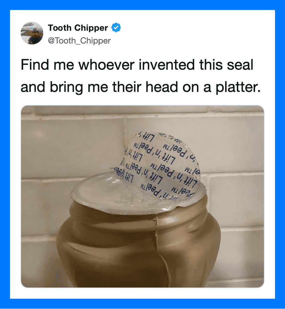 Humorous tweet about a seal with a plastic lid on its head.